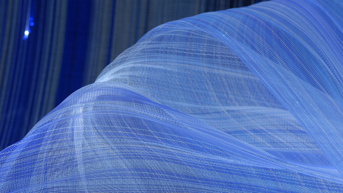 Sensory high-performance fiber core, fabric and transparent fiber-matrix composites